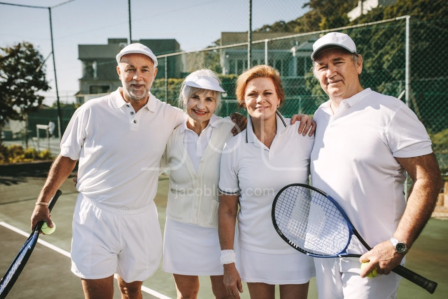 Seniors playing tennis